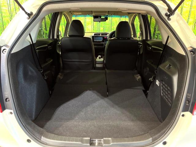 フィットハイブリッド Ｌパッケージ　純正ナビ　バックカメラ　衝突被害軽減システム　禁煙車　ハーフレザーシート　ドラレコ　スマートキー　ＬＥＤヘッド　ビルトインＥＴＣ　クルコン　オートライト　オートエアコン　Ｂｌｕｅｔｏｏｔｈ　ＣＤ（11枚目）