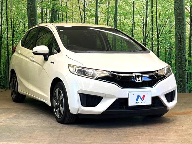 フィットハイブリッド Ｌパッケージ　純正ナビ　バックカメラ　衝突被害軽減システム　禁煙車　ハーフレザーシート　ドラレコ　スマートキー　ＬＥＤヘッド　ビルトインＥＴＣ　クルコン　オートライト　オートエアコン　Ｂｌｕｅｔｏｏｔｈ　ＣＤ（17枚目）