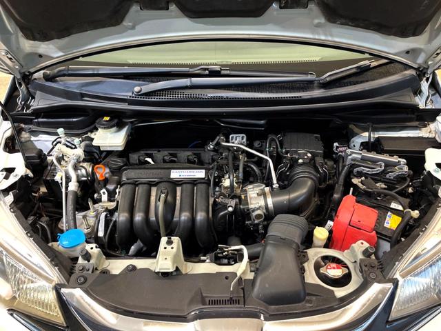 フィットハイブリッド Ｌパッケージ　純正ナビ　バックカメラ　衝突被害軽減システム　禁煙車　ハーフレザーシート　ドラレコ　スマートキー　ＬＥＤヘッド　ビルトインＥＴＣ　クルコン　オートライト　オートエアコン　Ｂｌｕｅｔｏｏｔｈ　ＣＤ（19枚目）