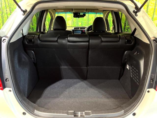 フィットハイブリッド Ｌパッケージ　純正ナビ　バックカメラ　衝突被害軽減システム　禁煙車　ハーフレザーシート　ドラレコ　スマートキー　ＬＥＤヘッド　ビルトインＥＴＣ　クルコン　オートライト　オートエアコン　Ｂｌｕｅｔｏｏｔｈ　ＣＤ（31枚目）