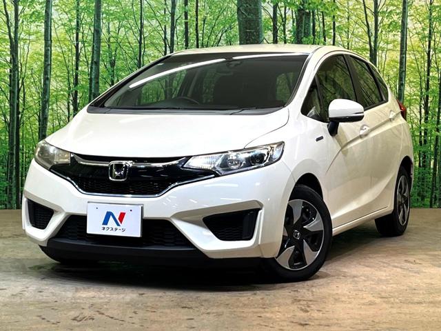 フィットハイブリッド Ｌパッケージ　純正ナビ　バックカメラ　衝突被害軽減システム　禁煙車　ハーフレザーシート　ドラレコ　スマートキー　ＬＥＤヘッド　ビルトインＥＴＣ　クルコン　オートライト　オートエアコン　Ｂｌｕｅｔｏｏｔｈ　ＣＤ（53枚目）