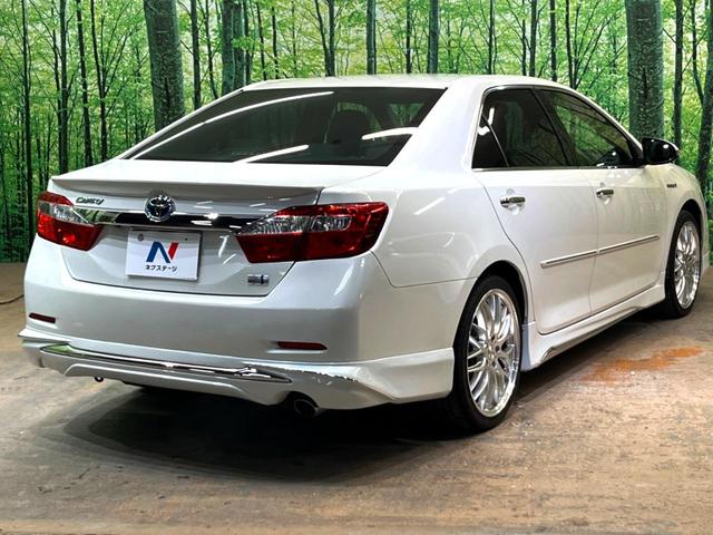 カムリ ハイブリッド　レザーパッケージ　純正ＨＤＤナビ　バックカメラ　黒本革シート　純正ＥＴＣ　シートヒーター　クルーズコントロール　スマートキー　ＨＩＤヘッドライト　ウッドコンビステアリング　フルセグＴＶ　オートライト（27枚目）