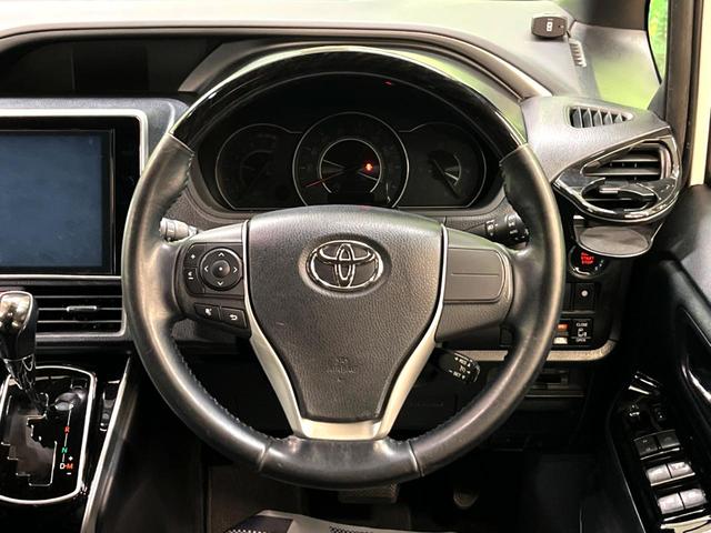 ヴォクシー ZS 煌 純正10型ナビ 後席モニター 両側電動スライド トヨタセーフティセンス クルーズコントロール 衝突軽減 車線逸脱防止 クリアランスソナー バックカメラ ETC LEDヘッドライト 本革巻きステアリング(14枚目)
