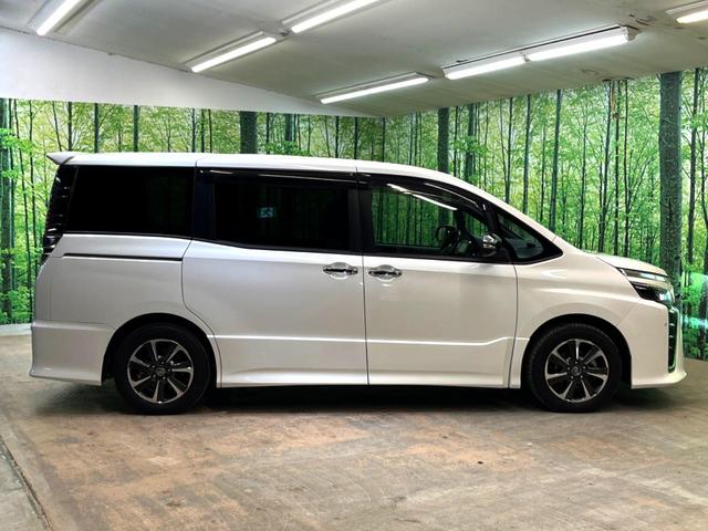 ヴォクシー ZS 煌 純正10型ナビ 後席モニター 両側電動スライド トヨタセーフティセンス クルーズコントロール 衝突軽減 車線逸脱防止 クリアランスソナー バックカメラ ETC LEDヘッドライト 本革巻きステアリング(56枚目)