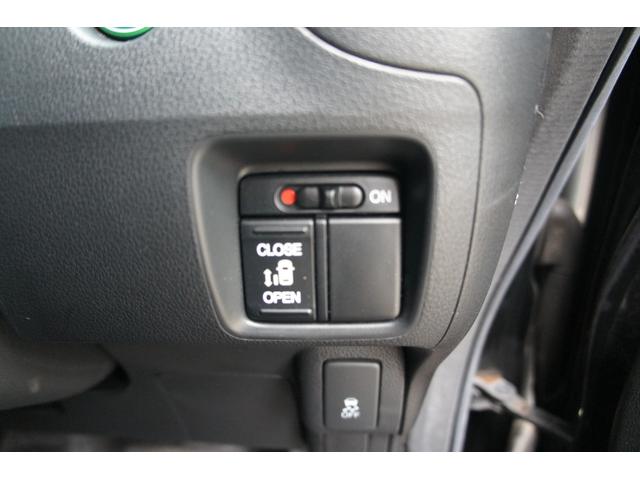 Ｎ－ＢＯＸカスタム Ｇ・Ｌパッケージ　純正ナビ　ＴＶ　ＥＴＣ　アルミホイール　保証１年　スマートキー　プッシュスタート　ディスチャージヘッドライト　パワーウィンドウ　両側スライドドア（7枚目）