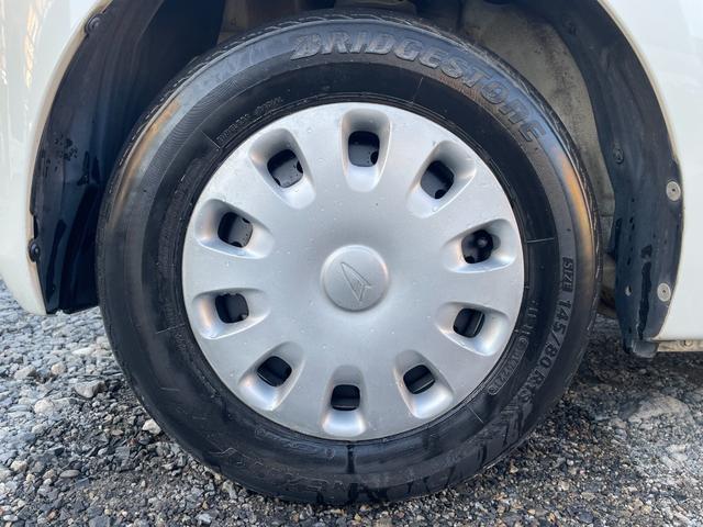 タント Xリミテッド 保証付 車検2年付 禁煙車 スマートキー 片側電動スライドドア 電格ミラー CD ラジオ ベンチシート フルフラット パワステ エアバッグABS 盗難防止装置 衝突安全ボディ AC PW スペアタイヤ(26枚目)