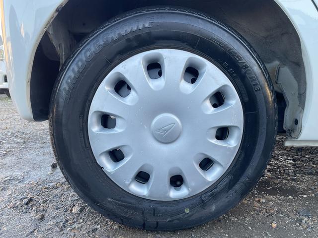 タント Xリミテッド 保証付 車検2年付 禁煙車 スマートキー 片側電動スライドドア 電格ミラー CD ラジオ ベンチシート フルフラット パワステ エアバッグABS 盗難防止装置 衝突安全ボディ AC PW スペアタイヤ(30枚目)