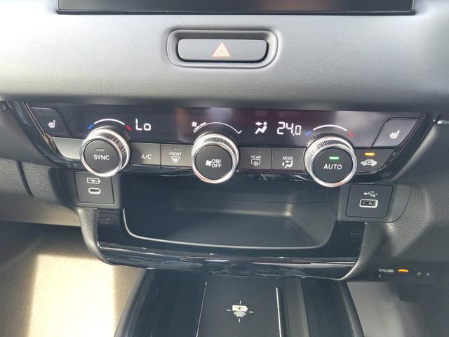 ヴェゼル ｅ：ＨＥＶＺ　Ｈｏｎｄａ　ＣＯＮＮＥＣＴディスプレー　Ｂｌｕｅｔｏｏｔｈ接続　ＥＴＣ２．０　ワイヤレス充電器　運転席＆助手席シートヒーター　パワーテールゲート　ブラインドスポットインフォメーション（25枚目）
