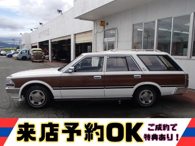 セドリックワゴン SGLリミテッド ★ベンチシート★コラムシフト★三列シート★ ★ベンチシート★コラムシフト★三列シート★8人乗り★ETC★電動アンテナ★ウッドパネル★前後メッキバンパー★メッキサイドミラー★ウッドデカール★電各ミラー★メッキドアバイザー★タイミングベルト交換済み(8枚目)