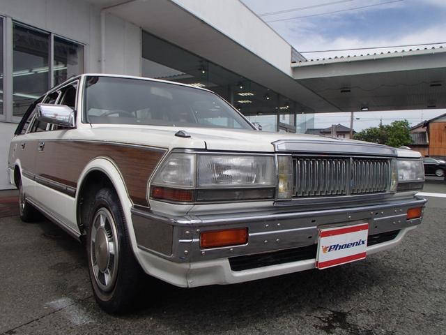 セドリックワゴン SGLリミテッド ★ベンチシート★コラムシフト★三列シート★ ★ベンチシート★コラムシフト★三列シート★8人乗り★ETC★電動アンテナ★ウッドパネル★前後メッキバンパー★メッキサイドミラー★ウッドデカール★電各ミラー★メッキドアバイザー★タイミングベルト交換済み(13枚目)