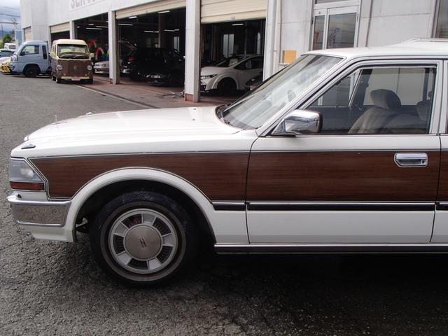 セドリックワゴン SGLリミテッド ★ベンチシート★コラムシフト★三列シート★ ★ベンチシート★コラムシフト★三列シート★8人乗り★ETC★電動アンテナ★ウッドパネル★前後メッキバンパー★メッキサイドミラー★ウッドデカール★電各ミラー★メッキドアバイザー★タイミングベルト交換済み(15枚目)