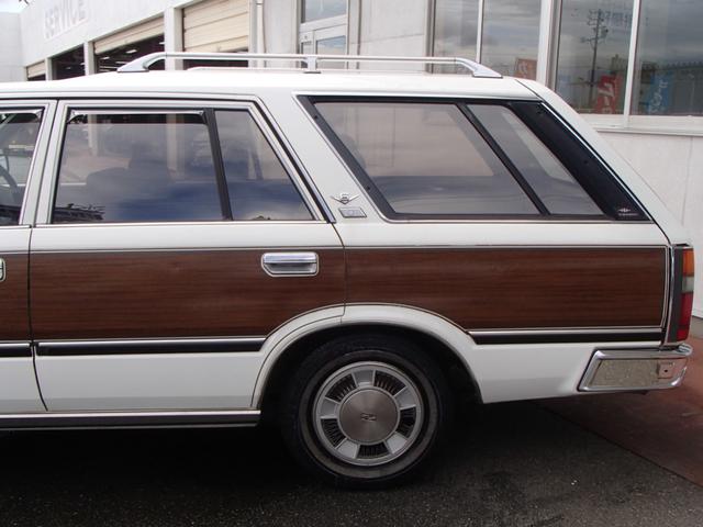 セドリックワゴン SGLリミテッド ★ベンチシート★コラムシフト★三列シート★ ★ベンチシート★コラムシフト★三列シート★8人乗り★ETC★電動アンテナ★ウッドパネル★前後メッキバンパー★メッキサイドミラー★ウッドデカール★電各ミラー★メッキドアバイザー★タイミングベルト交換済み(16枚目)