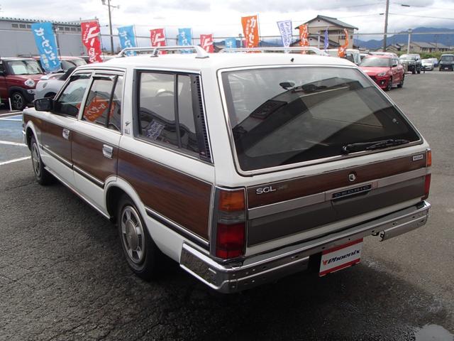 セドリックワゴン SGLリミテッド ★ベンチシート★コラムシフト★三列シート★ ★ベンチシート★コラムシフト★三列シート★8人乗り★ETC★電動アンテナ★ウッドパネル★前後メッキバンパー★メッキサイドミラー★ウッドデカール★電各ミラー★メッキドアバイザー★タイミングベルト交換済み(18枚目)