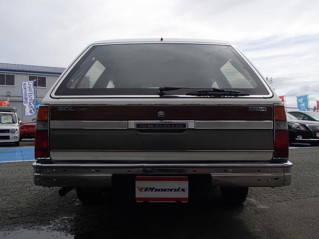 セドリックワゴン SGLリミテッド ★ベンチシート★コラムシフト★三列シート★ ★ベンチシート★コラムシフト★三列シート★8人乗り★ETC★電動アンテナ★ウッドパネル★前後メッキバンパー★メッキサイドミラー★ウッドデカール★電各ミラー★メッキドアバイザー★タイミングベルト交換済み(19枚目)