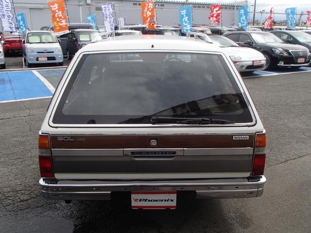 セドリックワゴン SGLリミテッド ★ベンチシート★コラムシフト★三列シート★ ★ベンチシート★コラムシフト★三列シート★8人乗り★ETC★電動アンテナ★ウッドパネル★前後メッキバンパー★メッキサイドミラー★ウッドデカール★電各ミラー★メッキドアバイザー★タイミングベルト交換済み(20枚目)