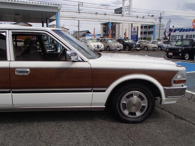 セドリックワゴン SGLリミテッド ★ベンチシート★コラムシフト★三列シート★ ★ベンチシート★コラムシフト★三列シート★8人乗り★ETC★電動アンテナ★ウッドパネル★前後メッキバンパー★メッキサイドミラー★ウッドデカール★電各ミラー★メッキドアバイザー★タイミングベルト交換済み(23枚目)