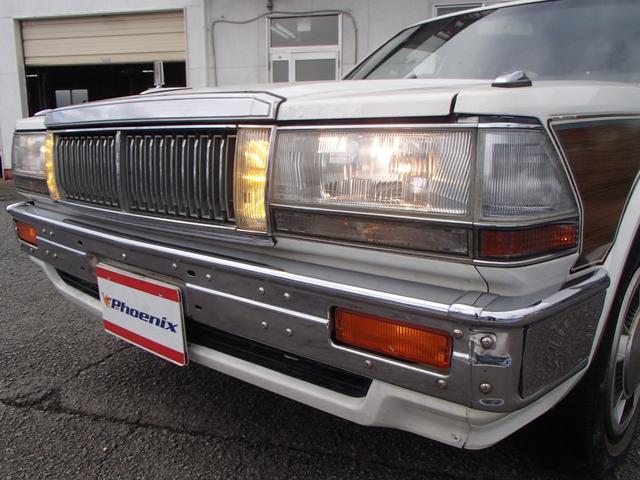 セドリックワゴン SGLリミテッド ★ベンチシート★コラムシフト★三列シート★ ★ベンチシート★コラムシフト★三列シート★8人乗り★ETC★電動アンテナ★ウッドパネル★前後メッキバンパー★メッキサイドミラー★ウッドデカール★電各ミラー★メッキドアバイザー★タイミングベルト交換済み(27枚目)