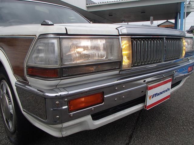 セドリックワゴン SGLリミテッド ★ベンチシート★コラムシフト★三列シート★ ★ベンチシート★コラムシフト★三列シート★8人乗り★ETC★電動アンテナ★ウッドパネル★前後メッキバンパー★メッキサイドミラー★ウッドデカール★電各ミラー★メッキドアバイザー★タイミングベルト交換済み(29枚目)