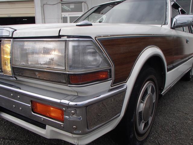 セドリックワゴン SGLリミテッド ★ベンチシート★コラムシフト★三列シート★ ★ベンチシート★コラムシフト★三列シート★8人乗り★ETC★電動アンテナ★ウッドパネル★前後メッキバンパー★メッキサイドミラー★ウッドデカール★電各ミラー★メッキドアバイザー★タイミングベルト交換済み(31枚目)