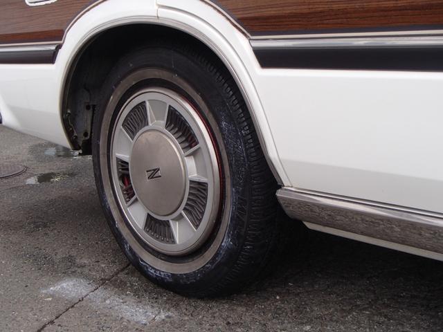 セドリックワゴン SGLリミテッド ★ベンチシート★コラムシフト★三列シート★ ★ベンチシート★コラムシフト★三列シート★8人乗り★ETC★電動アンテナ★ウッドパネル★前後メッキバンパー★メッキサイドミラー★ウッドデカール★電各ミラー★メッキドアバイザー★タイミングベルト交換済み(35枚目)