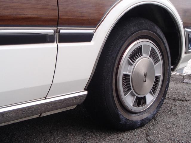 セドリックワゴン SGLリミテッド ★ベンチシート★コラムシフト★三列シート★ ★ベンチシート★コラムシフト★三列シート★8人乗り★ETC★電動アンテナ★ウッドパネル★前後メッキバンパー★メッキサイドミラー★ウッドデカール★電各ミラー★メッキドアバイザー★タイミングベルト交換済み(36枚目)