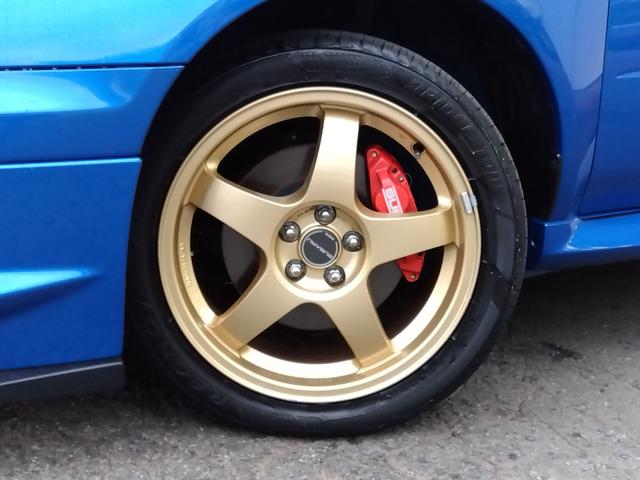 インプレッサ ＷＲＸ　２００４　Ｖリミテッド★インタークーラーターボ★　★ターボモデル★４ＷＤ★Ｅ型★ＳＴＩフロントスポイラー★ＳＴＩゲノムマフラー★大型リアスポイラー★純正ＲＡＹＳ１７インチホイール★特別仕様車専用内装★キーレスキー★ＨＩＤ／ヘッドライト★ステアシフト★（23枚目）
