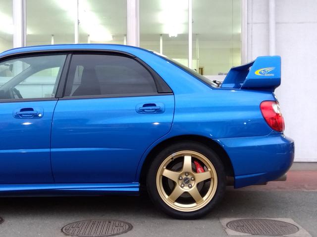インプレッサ ＷＲＸ　２００４　Ｖリミテッド★インタークーラーターボ★　★ターボモデル★４ＷＤ★Ｅ型★ＳＴＩフロントスポイラー★ＳＴＩゲノムマフラー★大型リアスポイラー★純正ＲＡＹＳ１７インチホイール★特別仕様車専用内装★キーレスキー★ＨＩＤ／ヘッドライト★ステアシフト★（25枚目）