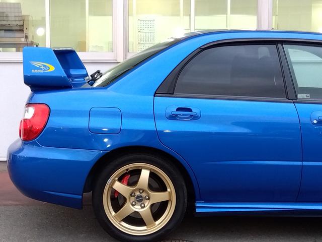 インプレッサ ＷＲＸ　２００４　Ｖリミテッド★インタークーラーターボ★　★ターボモデル★４ＷＤ★Ｅ型★ＳＴＩフロントスポイラー★ＳＴＩゲノムマフラー★大型リアスポイラー★純正ＲＡＹＳ１７インチホイール★特別仕様車専用内装★キーレスキー★ＨＩＤ／ヘッドライト★ステアシフト★（29枚目）