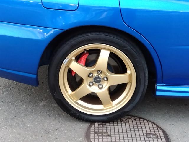 インプレッサ ＷＲＸ　２００４　Ｖリミテッド★インタークーラーターボ★　★ターボモデル★４ＷＤ★Ｅ型★ＳＴＩフロントスポイラー★ＳＴＩゲノムマフラー★大型リアスポイラー★純正ＲＡＹＳ１７インチホイール★特別仕様車専用内装★キーレスキー★ＨＩＤ／ヘッドライト★ステアシフト★（31枚目）