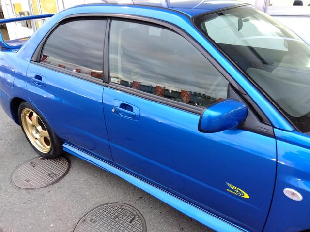 インプレッサ ＷＲＸ　２００４　Ｖリミテッド★インタークーラーターボ★　★ターボモデル★４ＷＤ★Ｅ型★ＳＴＩフロントスポイラー★ＳＴＩゲノムマフラー★大型リアスポイラー★純正ＲＡＹＳ１７インチホイール★特別仕様車専用内装★キーレスキー★ＨＩＤ／ヘッドライト★ステアシフト★（32枚目）