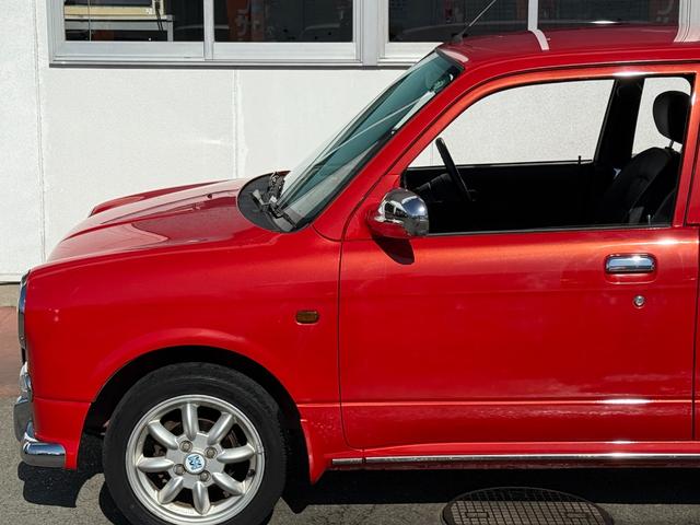 ミラジーノ ミニライトスペシャルターボ★５速マニュアル★禁煙車★後期★　★ターボモデル★５速マニュアル★禁煙車★後期モデル★メッキ架装★ミニライト純正アルミ★キーレスキー★ブラックウッドパネル★プロテインレザーシート★タイミングベルト１０８，０５５キロにて交換済み★（18枚目）