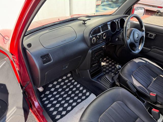 ミラジーノ ミニライトスペシャルターボ★５速マニュアル★禁煙車★後期★　★ターボモデル★５速マニュアル★禁煙車★後期モデル★メッキ架装★ミニライト純正アルミ★キーレスキー★ブラックウッドパネル★プロテインレザーシート★タイミングベルト１０８，０５５キロにて交換済み★（32枚目）