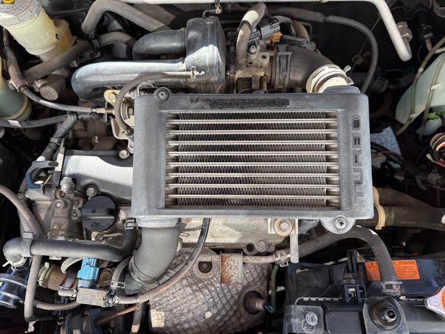 ミラジーノ ミニライトスペシャルターボ★５速マニュアル★禁煙車★後期★　★ターボモデル★５速マニュアル★禁煙車★後期モデル★メッキ架装★ミニライト純正アルミ★キーレスキー★ブラックウッドパネル★プロテインレザーシート★タイミングベルト１０８，０５５キロにて交換済み★（50枚目）