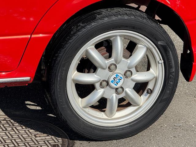 ミラジーノ ミニライトスペシャルターボ★５速マニュアル★禁煙車★後期★　★ターボモデル★５速マニュアル★禁煙車★後期モデル★メッキ架装★ミニライト純正アルミ★キーレスキー★ブラックウッドパネル★プロテインレザーシート★タイミングベルト１０８，０５５キロにて交換済み★（51枚目）