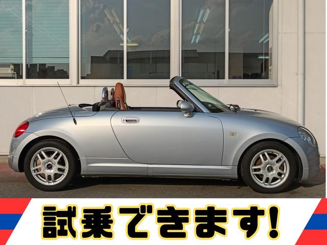 コペン アクティブトップ★MOMOステア★革調シート★ターボ★ MOMOウッドコンビハンドル キーレス ウッドパネル 革調シートカバー ENKEIアルミホイール 電動オープン ターボ シフトマチック 走行56546KM 試乗出来ます 修復歴無し 車検2年取得渡し(3枚目)