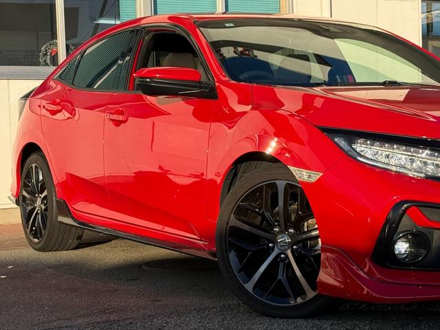 シビック ハッチバック★６ＭＴ★ＶＴＥＣターボ★無限ＬＥＤテールランプ　ハーフレザーシート　ＬＥＤライト　純正フルエアロ　シートヒーター　純正１８インチアルミ　ホンダセンシング　バックカメラ　スマートキー　ビルトインＥＴＣ２．０　地デジＴＶ　パワーシート　６速ＭＴターボ（23枚目）