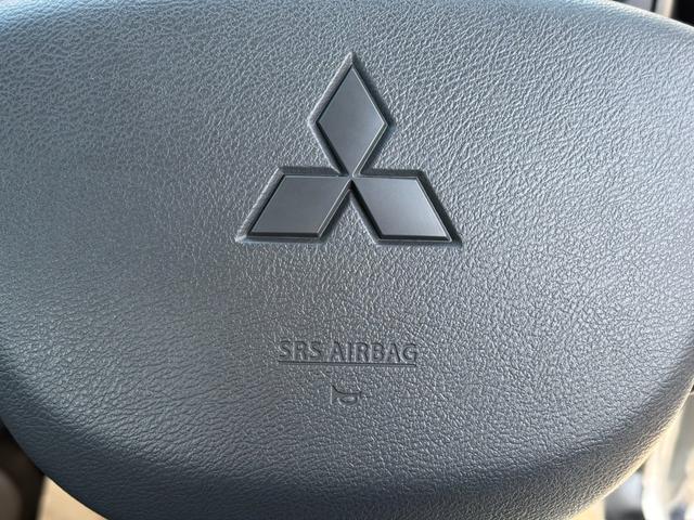 ミニキャブトラック M 5MT・4WD・届出済未使用車・キャリィトラックOEM・キーレス・パワーウインドウ・リアパーキングセンサー・オートライト・エアコン・パワステ・AM/FMラジオ・両席エアバッグ・三方開・シガーソケット(42枚目)