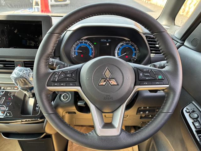 デリカミニ Ｔ　プレミアム　リミテッドエディション　４ＷＤ・届出済未使用車・ターボ・両側電動・マイパイロット・マルチアラウンドモニター・ハンドルヒーター・シートヒーター・ハイブリッド・キーフリー・ＬＥＤヘッド・サーキュレーター・シートバックテーブル（64枚目）