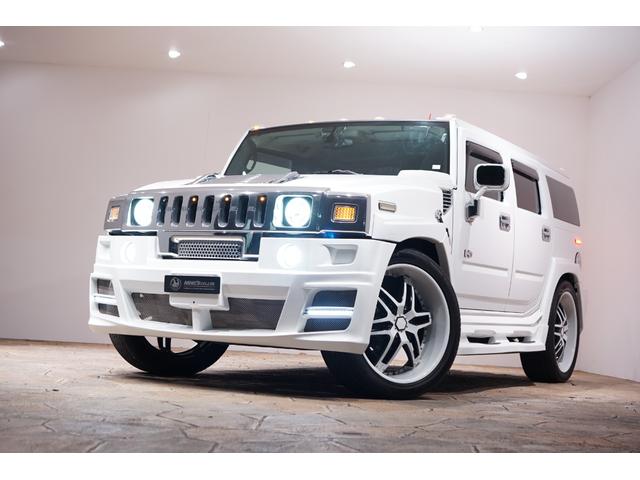 ハマーＨ２ タイプＧ　三井物産ディーラー車両　ネクストネーションエアロ６本出しエキゾーストマフラー　２６ＡＷ　ローダウン　フローティングナビ　黒革　サンルーフ　コンビハンドル　セキュリティ　ＬＥＤテール（35枚目）