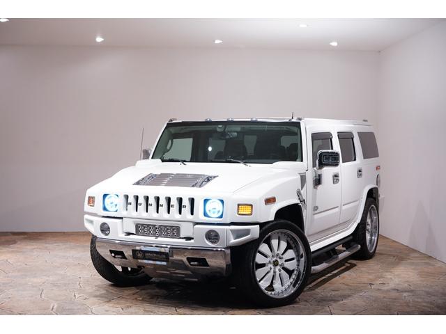 ハマーＨ２ ラグジュアリーパッケージ　ホワイトスタイリング　社外２４ＡＷ　サンルーフ　内装張替え　黒革シート　ＬＥＤテール　社外マフラー　社外ビッグナビインストール（6枚目）