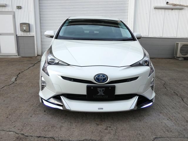 プリウス Ａプレミアム　純正９インチナビ　モデリスタフルエアロ　本革シート　社外１８ＡＷ　電動シート　シートヒーター　地デジ　Ｂモニ　ＥＴＣ　ＢＳＭ　ＨＵＤ　障害物センサー　レーダークルーズ　セーフティセンス（5枚目）