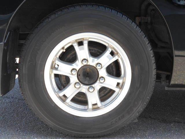 NV350キャラバンバン ロングプレミアムGX 純正SDナビ バックカメラ 両側スライドドア スマートキー 社外ベットキット 社外LEDテール 15インチアルミホイール Bluetooth フルセグTV ETC ミュージックサーバー 盗難防止装置(31枚目)