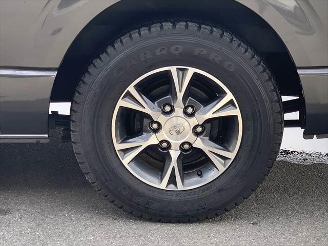 ハイエースバン ロングスーパーＧＬ　純正ＨＤＤナビ　Ｂｌｕｅｔｏｏｔｈ　地デジＴＶ　バックカメラ　両側スライドドア　禁煙車　ＥＴＣ　盗難防止装置　キーレスエントリー　電動格納ミラー　純正１５インチアルミホイール　パワーウィンドウ（28枚目）