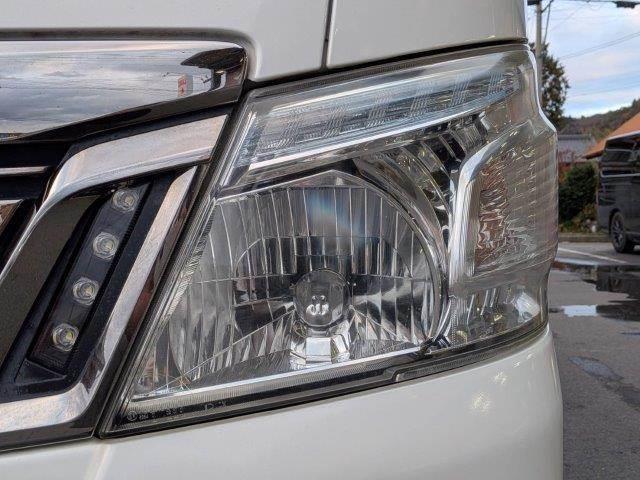 NV350キャラバンバン ロングプレミアムGXターボ 衝突軽減ブレーキ 防水シート HIDヘッドライト バックカメラ 純正SDナビ 禁煙車 フルセグTV Bluetooth スマートキー ベットキット フロントエアロ 盗難防止装置 両側スライドドア(24枚目)