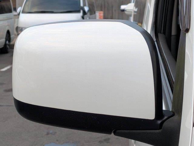 NV350キャラバンバン ロングプレミアムGXターボ 衝突軽減ブレーキ 防水シート HIDヘッドライト バックカメラ 純正SDナビ 禁煙車 フルセグTV Bluetooth スマートキー ベットキット フロントエアロ 盗難防止装置 両側スライドドア(29枚目)