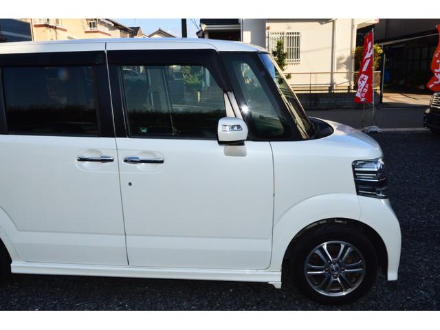 Ｎ－ＢＯＸカスタム Ｇ・Ｌパッケージ　ナビ　バックカメラ　ＴＶ　ＤＶＤ　ＣＤ　ＥＴＣ　セキュリティアラーム　スマキー　助手席エアバッグ　運転席エアバッグ　キーレス　全席ＰＷ　ＡＢＳ　ＡＡＣ　衝突安全ボディ　パワステ　アイドリング　ベンチ席（32枚目）