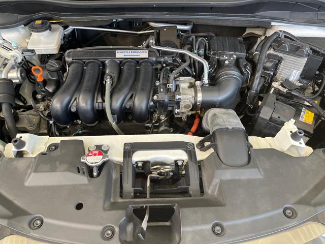 ヴェゼル ハイブリッドＸ・ホンダセンシング　純正ＳＤナビ　バックカメラ　ホンダセンシング　レーダークルーズ　禁煙車　スマートキー　ＬＥＤヘッド　ビルトインＥＴＣ　車線逸脱警報　オートライト　デュアルエアコン　純正１６インチアルミ（18枚目）