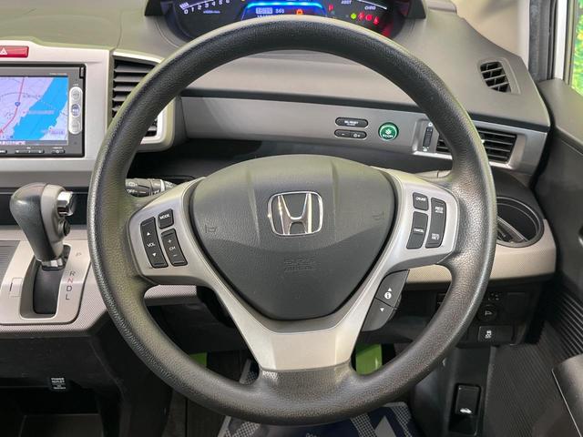フリードハイブリッド ジャストセレクション　両側電動ドア　純正ＳＤナビ　バックカメラ　禁煙車　スマートキー　ＨＩＤヘッド　ビルトインＥＴＣ　クルコン　オートライト　オートエアコン　Ｂｌｕｅｔｏｏｔｈ　ＣＤ　ＤＶＤ再生　地デジ（12枚目）
