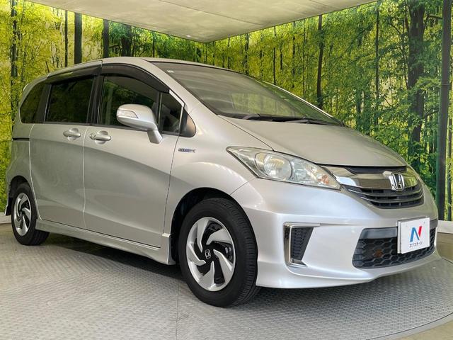 フリードハイブリッド ジャストセレクション　両側電動ドア　純正ＳＤナビ　バックカメラ　禁煙車　スマートキー　ＨＩＤヘッド　ビルトインＥＴＣ　クルコン　オートライト　オートエアコン　Ｂｌｕｅｔｏｏｔｈ　ＣＤ　ＤＶＤ再生　地デジ（17枚目）