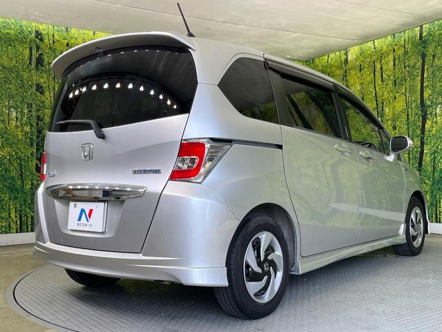 フリードハイブリッド ジャストセレクション　両側電動ドア　純正ＳＤナビ　バックカメラ　禁煙車　スマートキー　ＨＩＤヘッド　ビルトインＥＴＣ　クルコン　オートライト　オートエアコン　Ｂｌｕｅｔｏｏｔｈ　ＣＤ　ＤＶＤ再生　地デジ（18枚目）